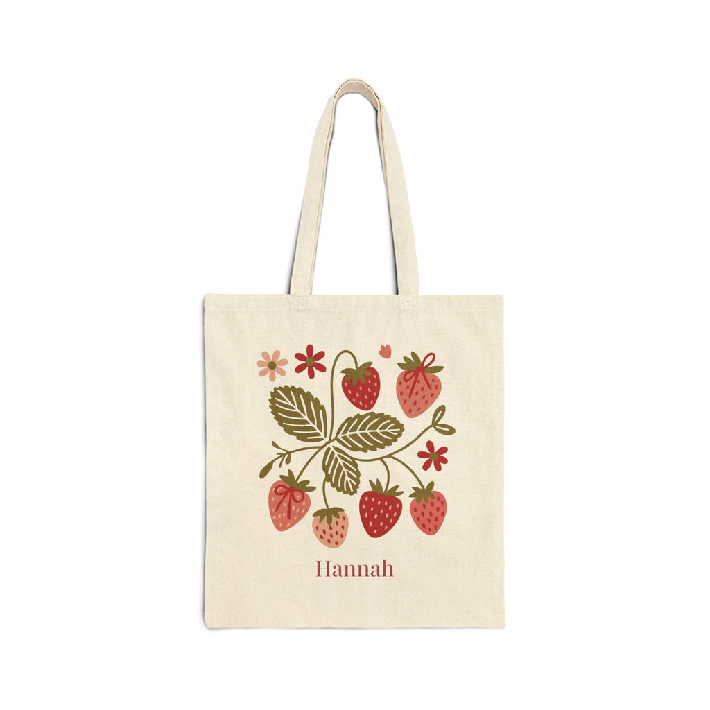 Personalized strawberry tote bag with name Hannah on natural canvas