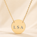 Personalized three-initial necklace with custom engraved letters LSA on gold circle pendant