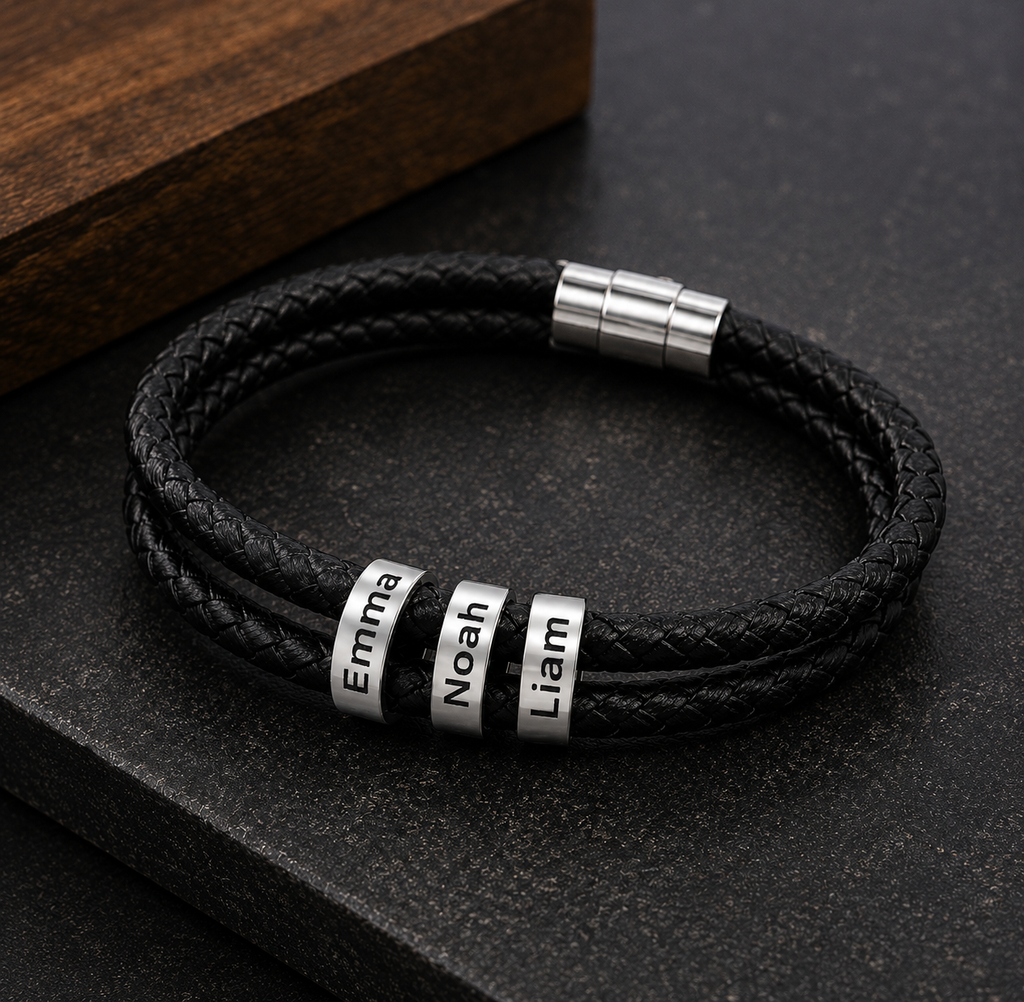 Close-up of three engraved kid names on personalized leather bracelet