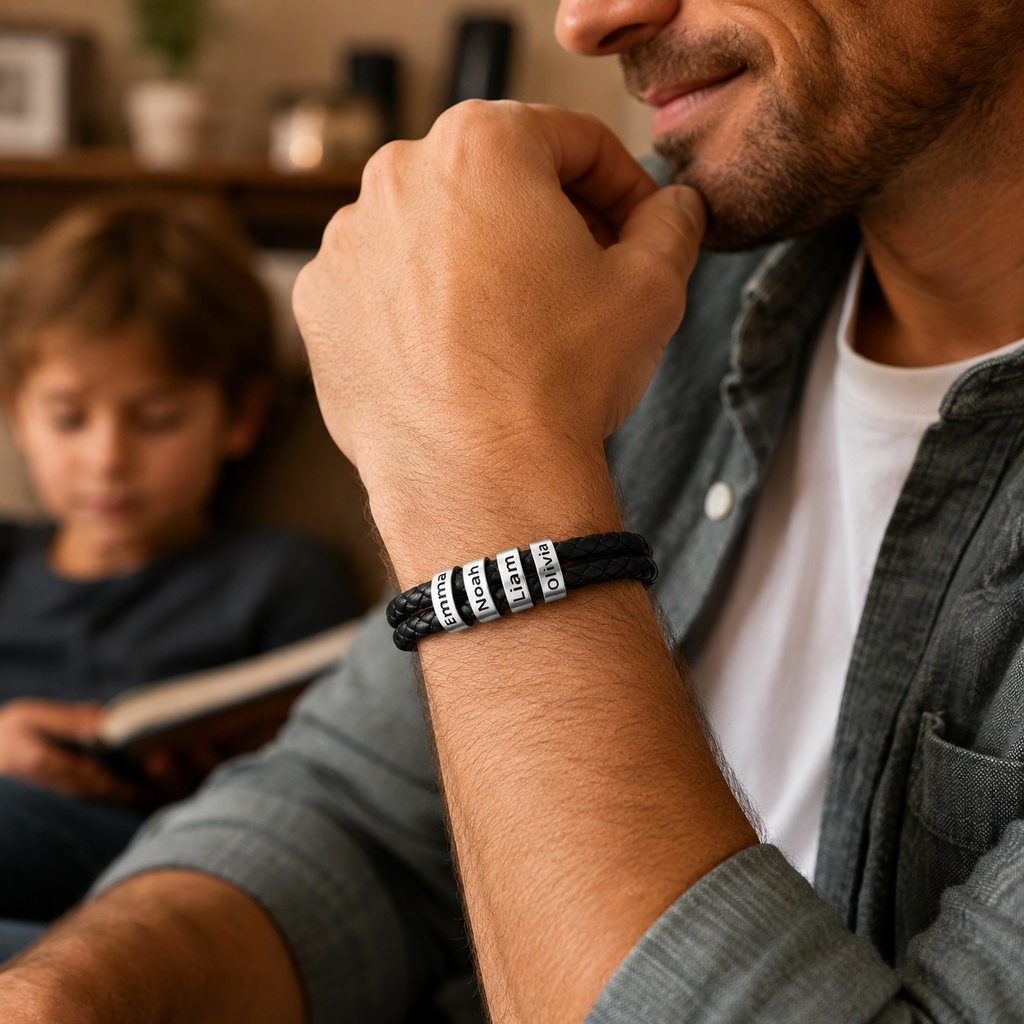 Family bracelet with four children names on black braided leather