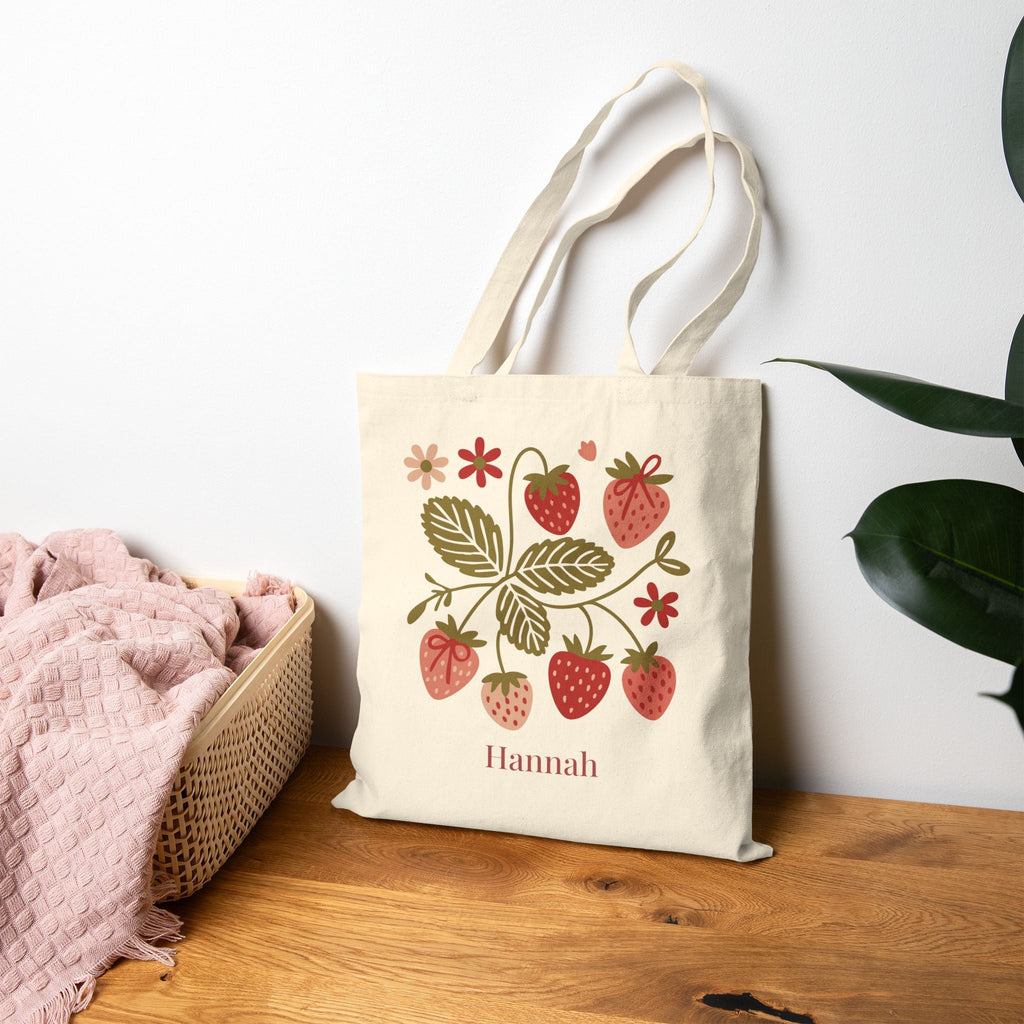 Personalized tote bag hanging in home setting