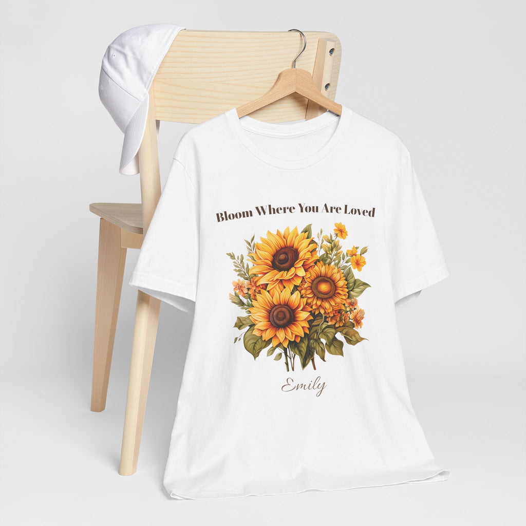 Bloom Where You Are Loved cotton t-shirt styled in a cozy home setting