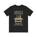 Personalized Daddy's Workshop black t-shirt with a vintage workbench-and-tools design and custom kids' names