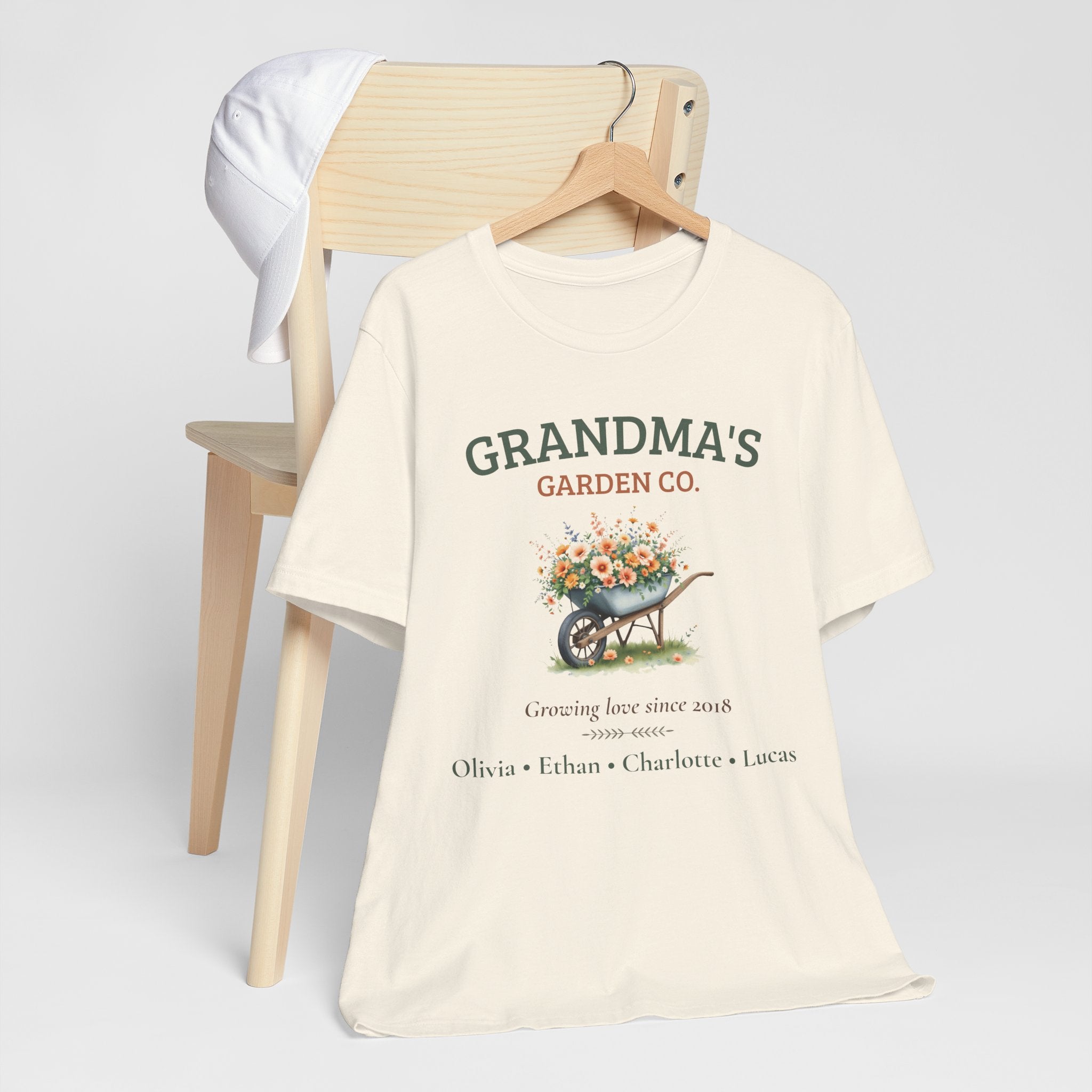 Grandma's Garden Co. personalized t-shirt flat-lay with greenery