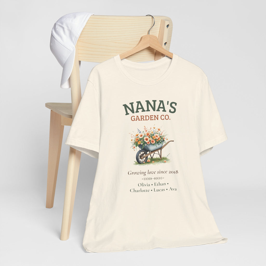 Nana's Garden Co. personalized t-shirt flat-lay with greenery