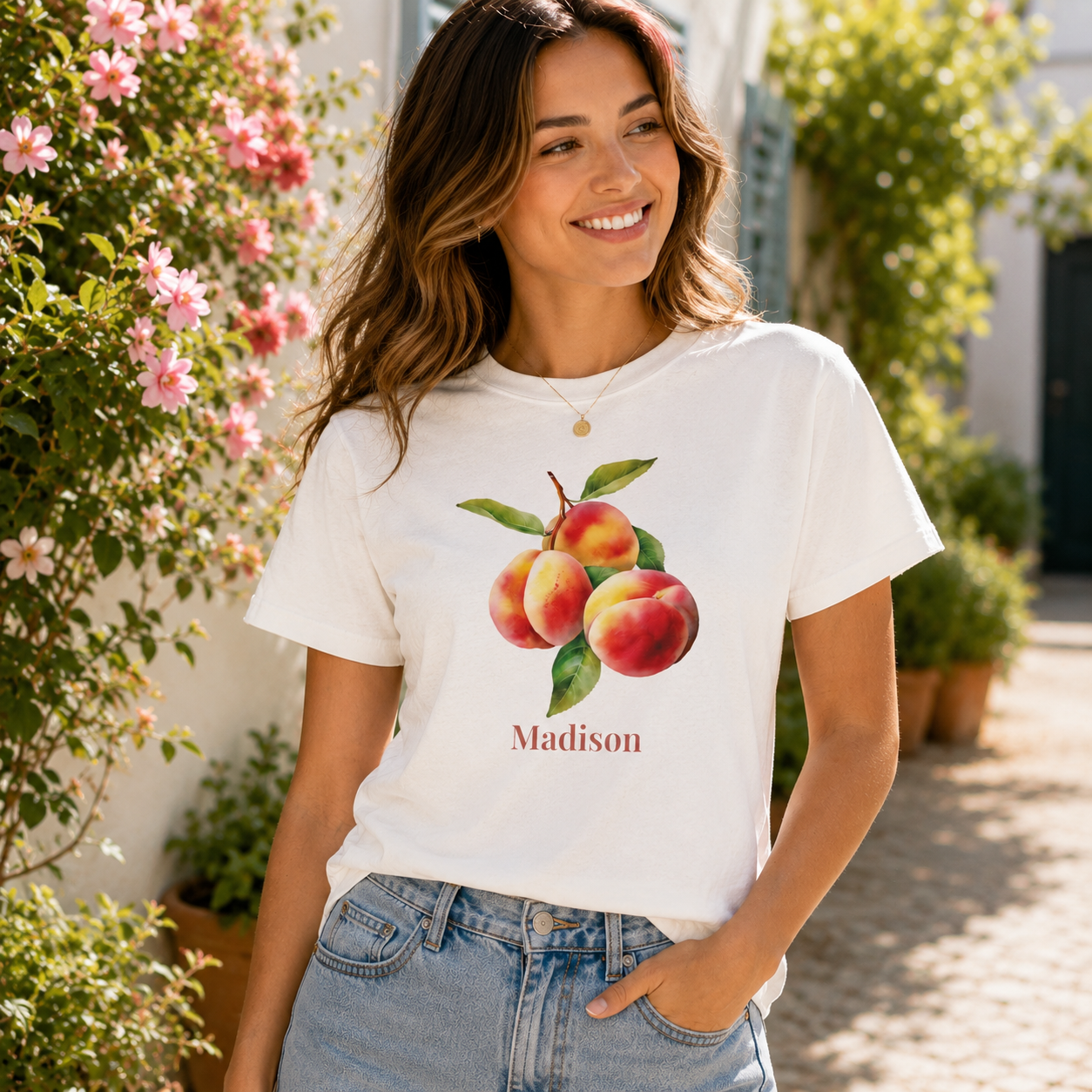 Close-up of peach branch graphic with personalized name print