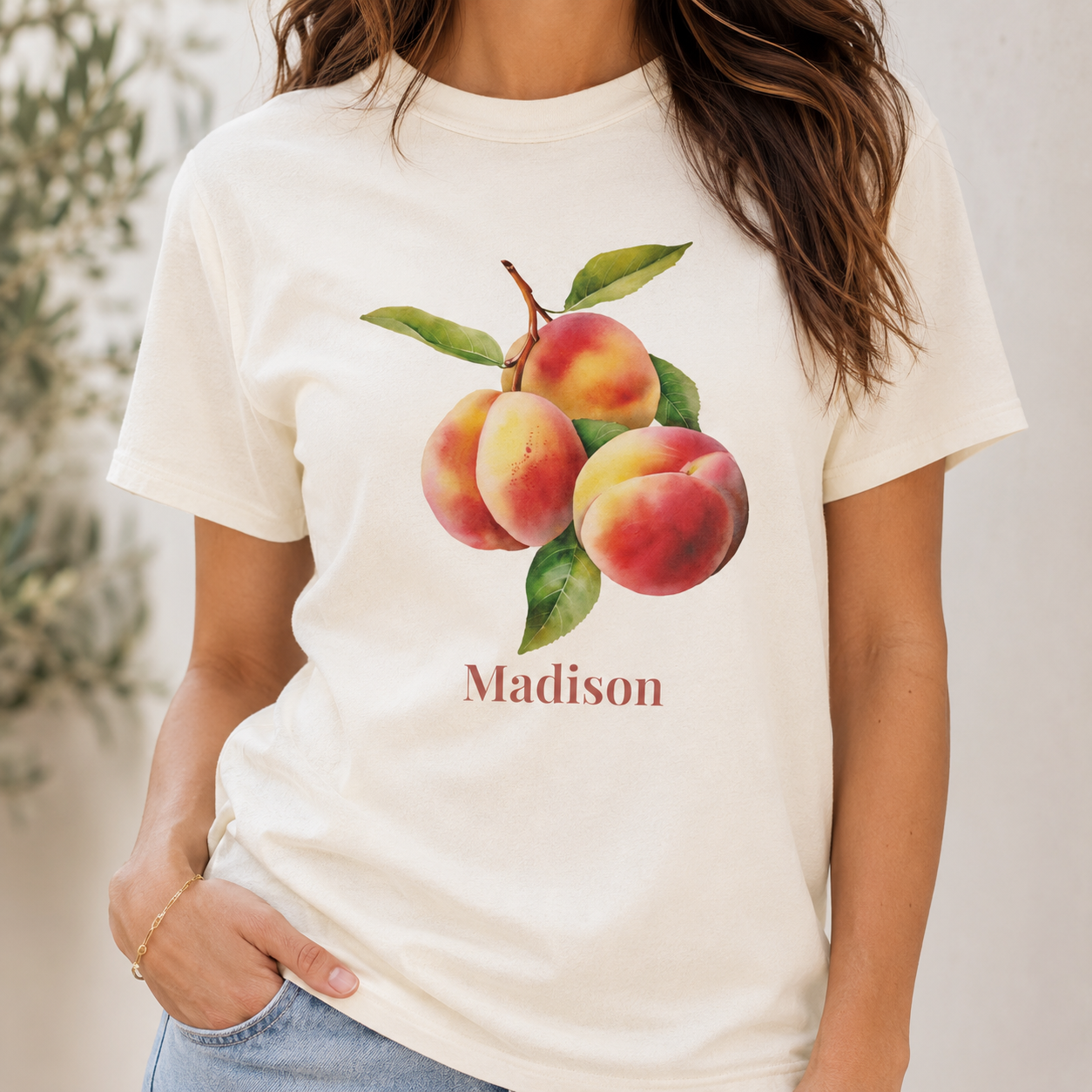 Peach personalized t-shirt on hanger