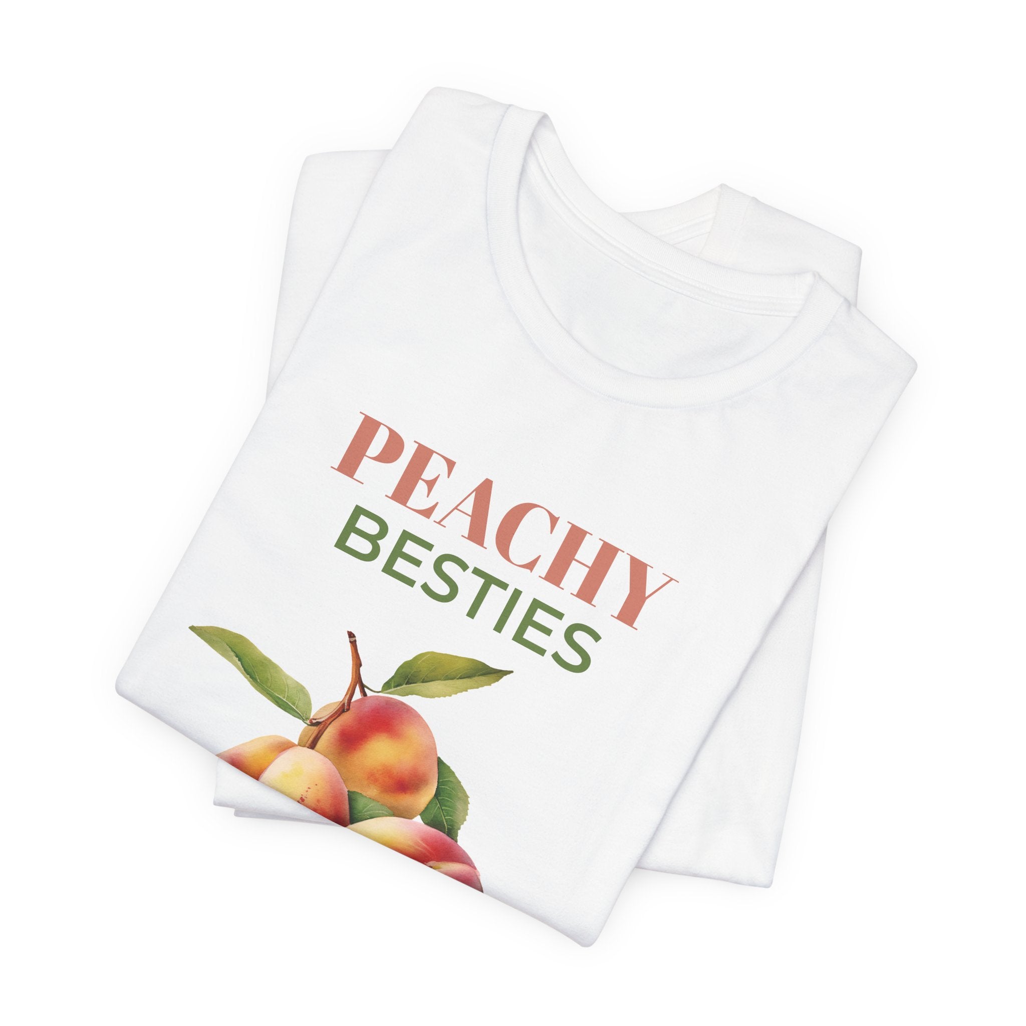 Peachy Besties cotton t-shirt styled in a cozy home setting