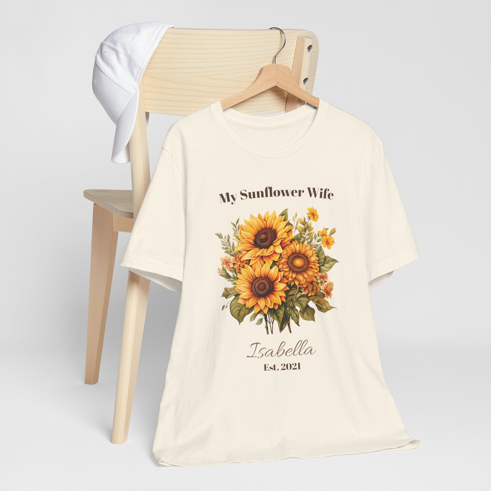 My Sunflower Wife personalized t-shirt flat-lay with greenery