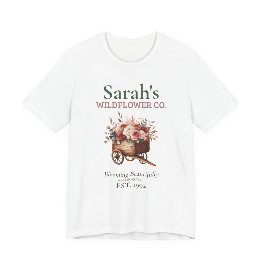 Personalized Wildflower Co. birthday t-shirt with a custom name, 'EST.' year and a floral cart design